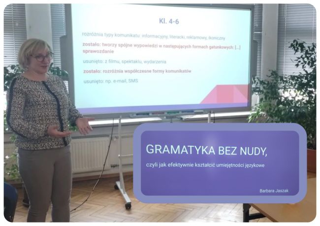 Prowadząca stoi przy tablicy interaktywnej. Omawia prezentację.